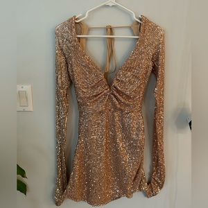 Lucy in the sky mini dress NEVER WORN. Perfect for New Year’s Eve!!